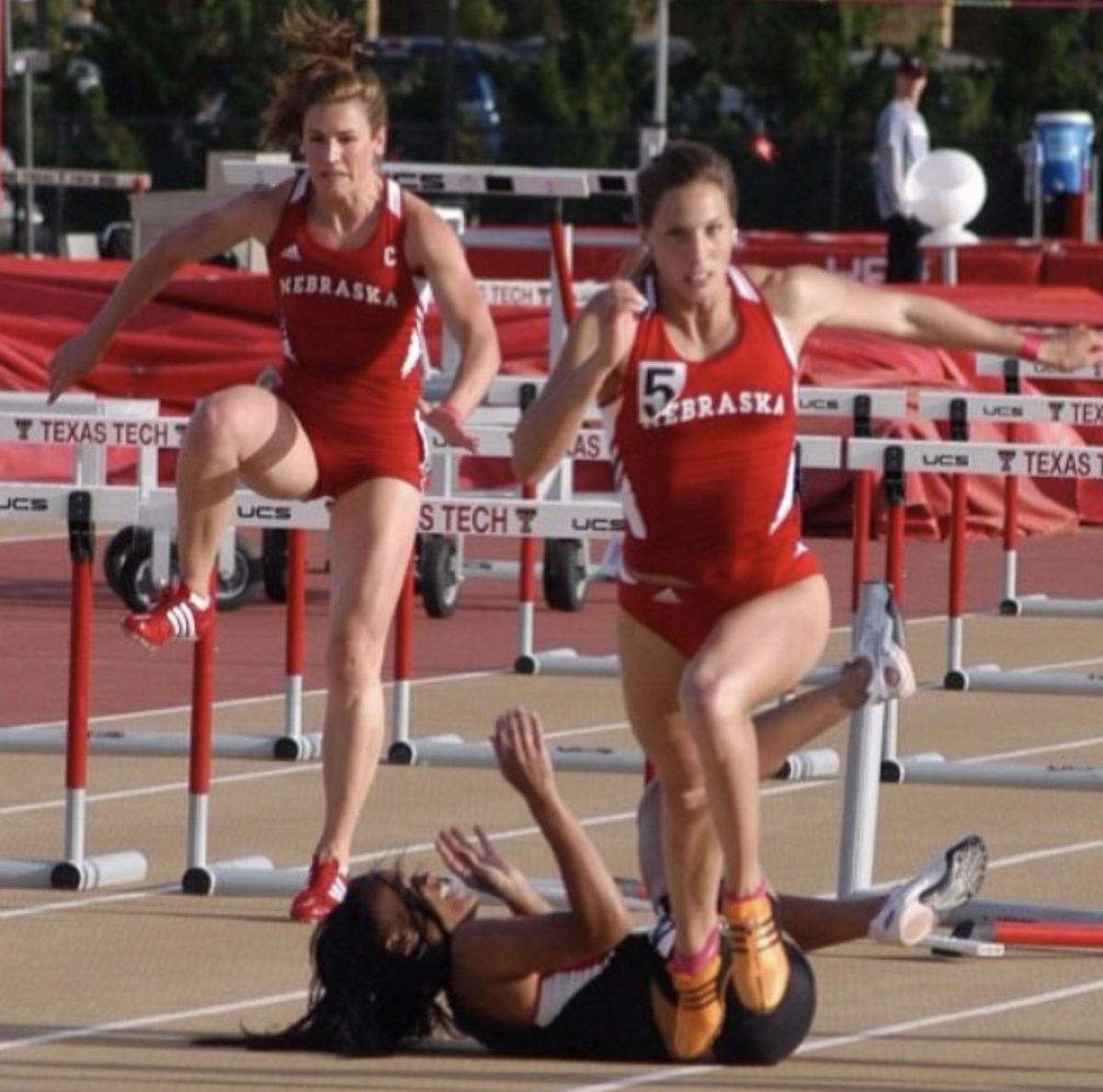 Arna Erega racing over hurdles